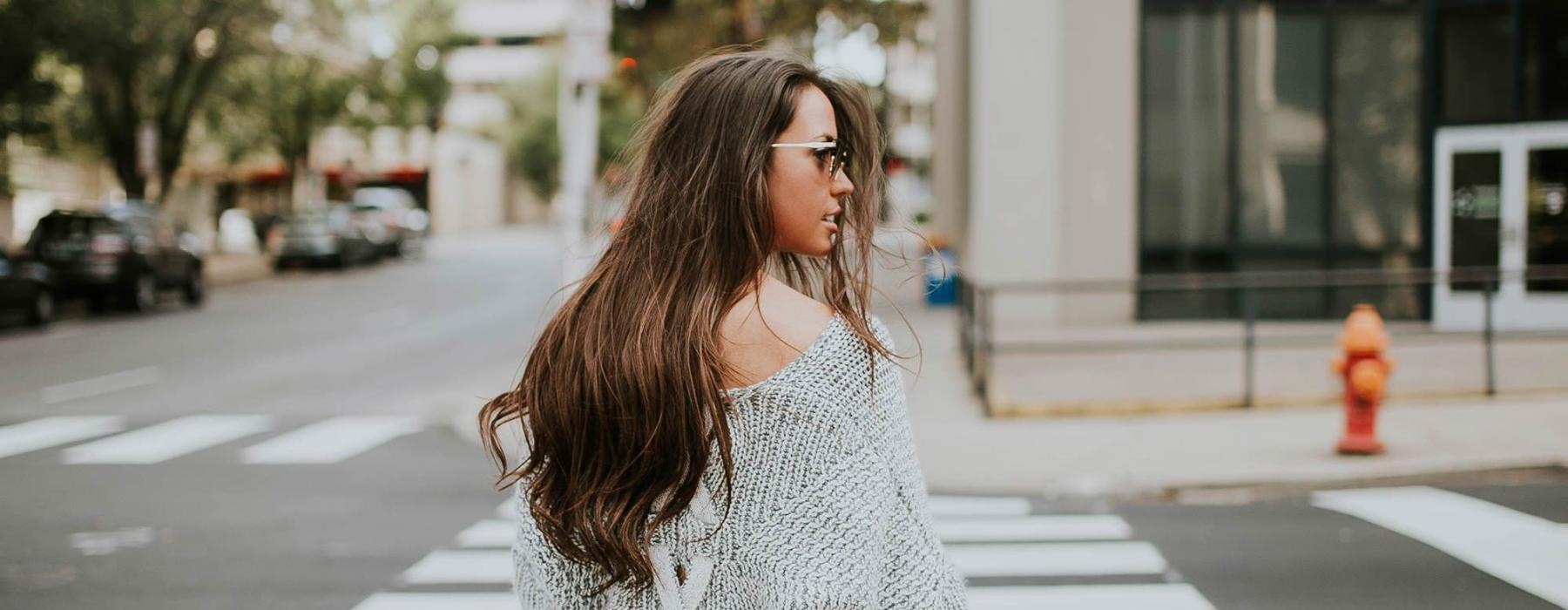 a person walking in a crosswalk